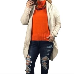 Dana Buchman orange turtleneck sweater